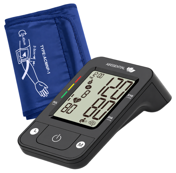 A digital wrist blood pressure monitor with a black handheld unit and a navy blue arm cuff.